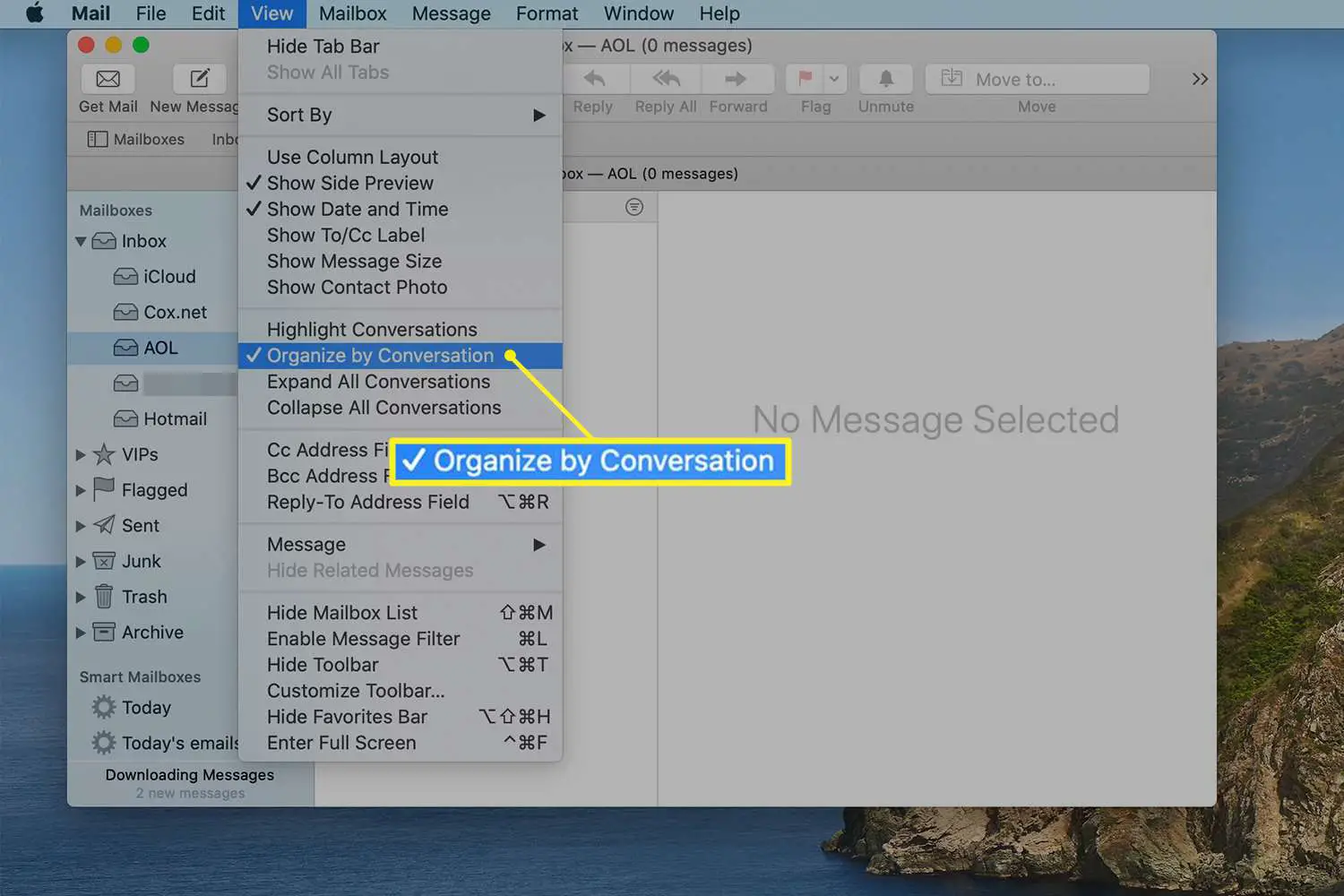 Menu Exibir no Mac Mail mostrando a opção Organizar por conversa