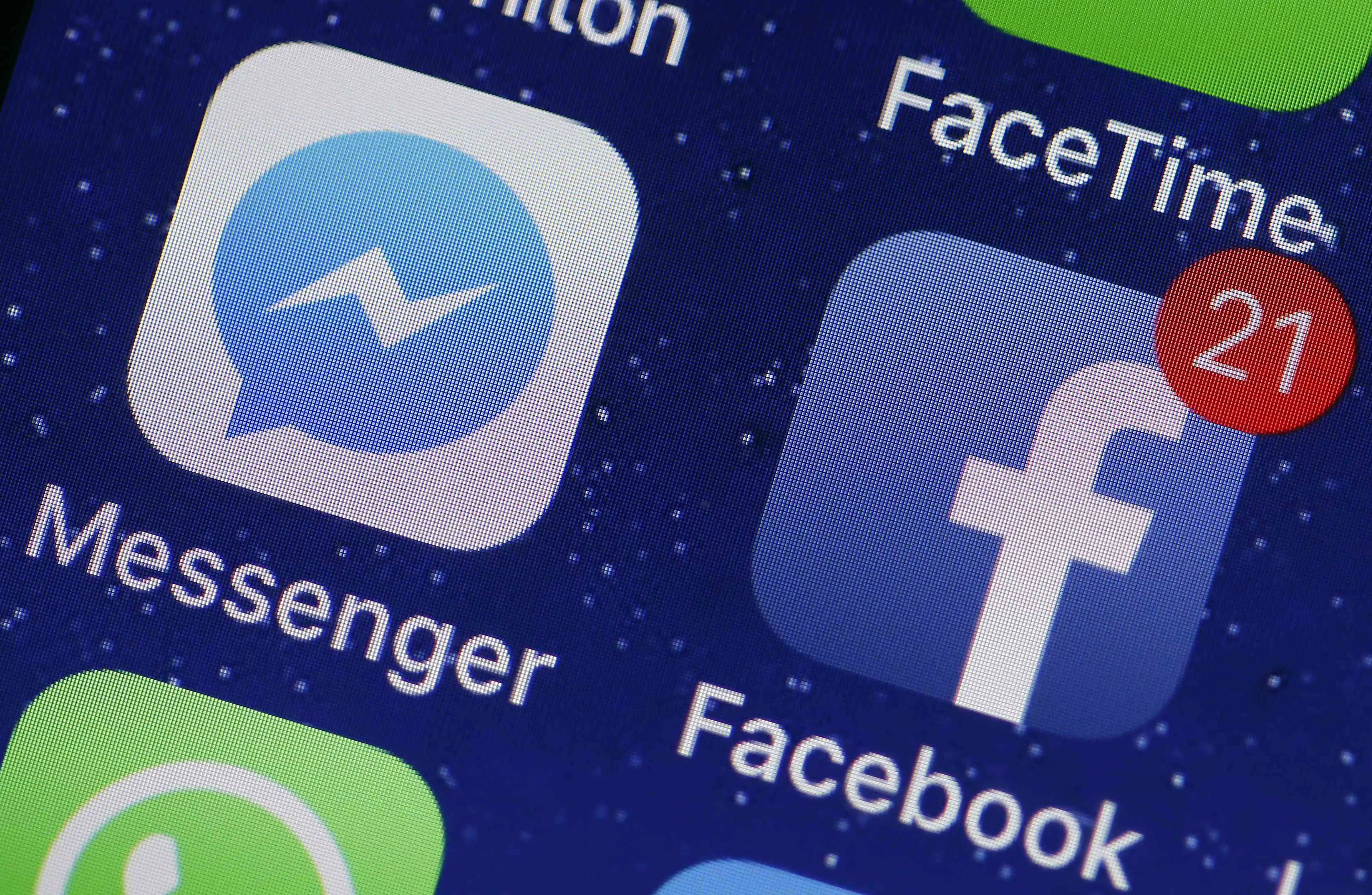 Ícones do Messenger e do Facebook em um iPhone