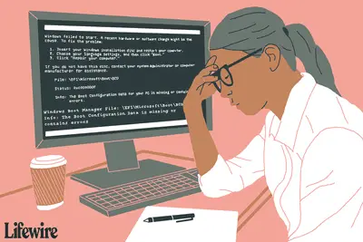 Pessoa frustrada diante de um computador com um erro do gerenciador de inicialização na tela