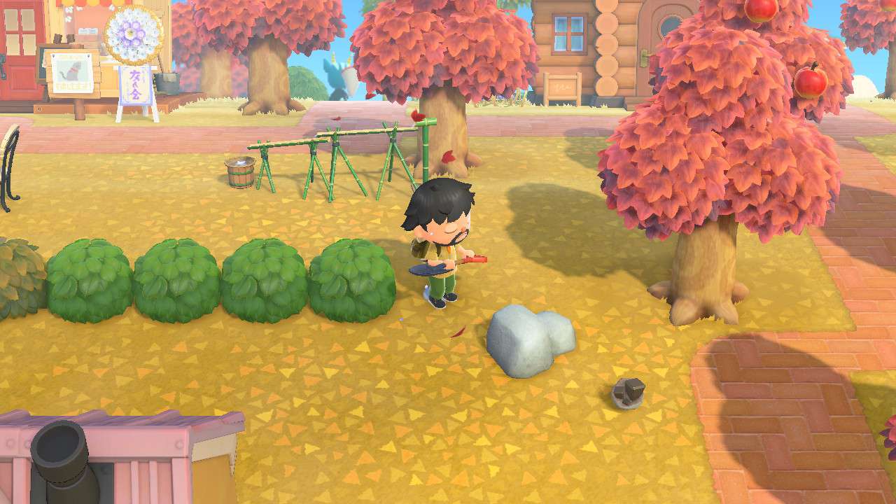 Personagem de Animal Crossing se balançando em uma pedra