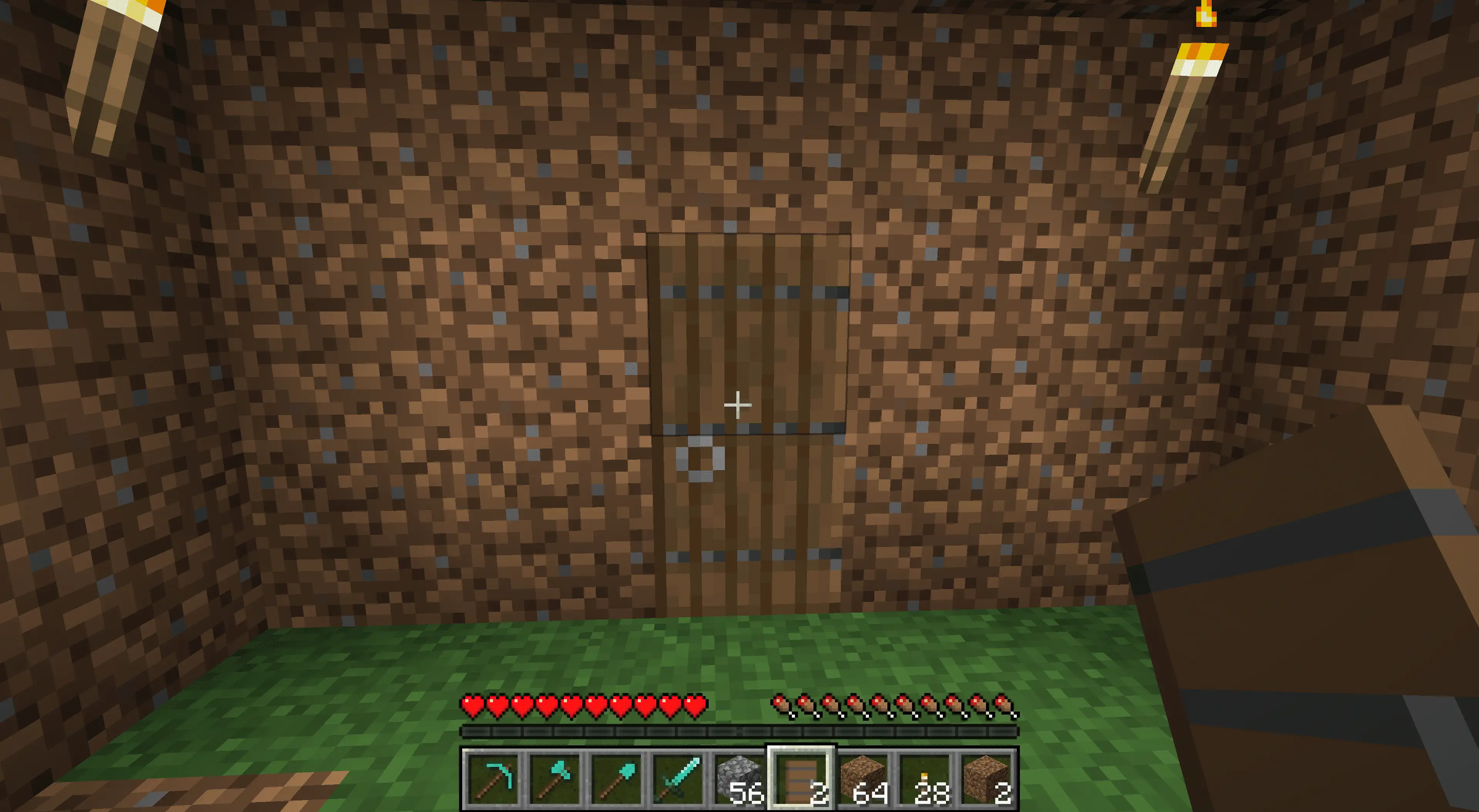 Uma porta em uma casa suja do Minecraft.