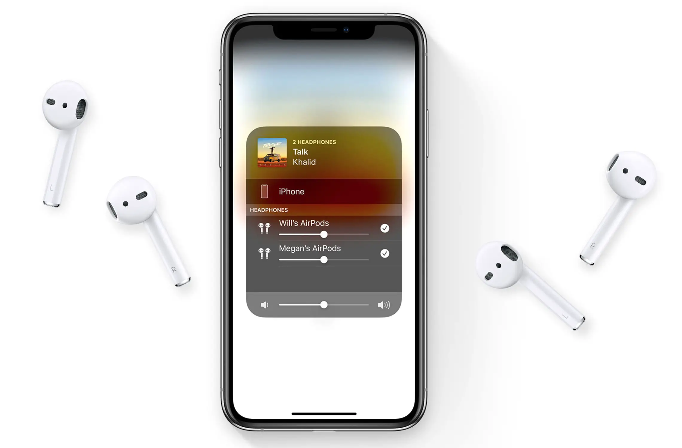 Um iPhone compartilhando áudio com 2 conjuntos de AirPods