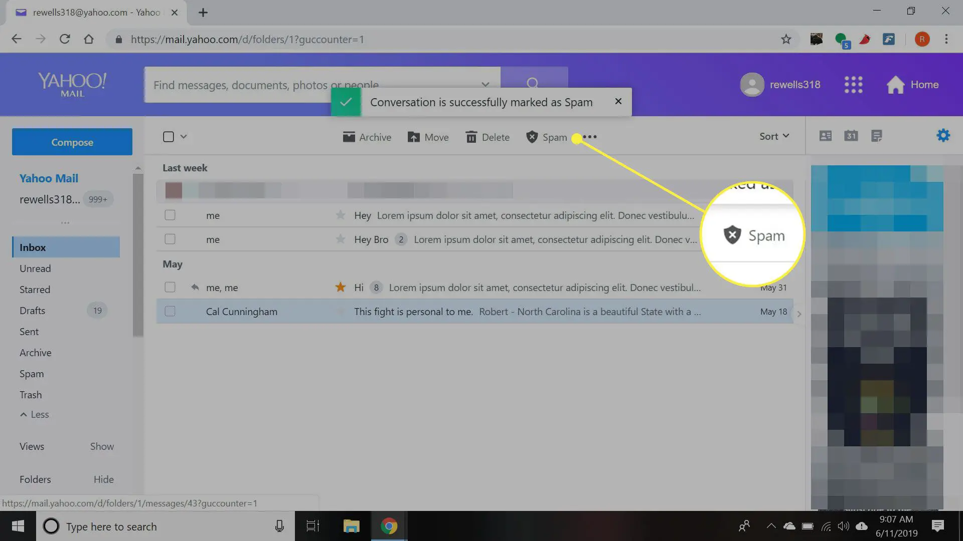 Uma captura de tela do Yahoo Mail com o botão Spam destacado