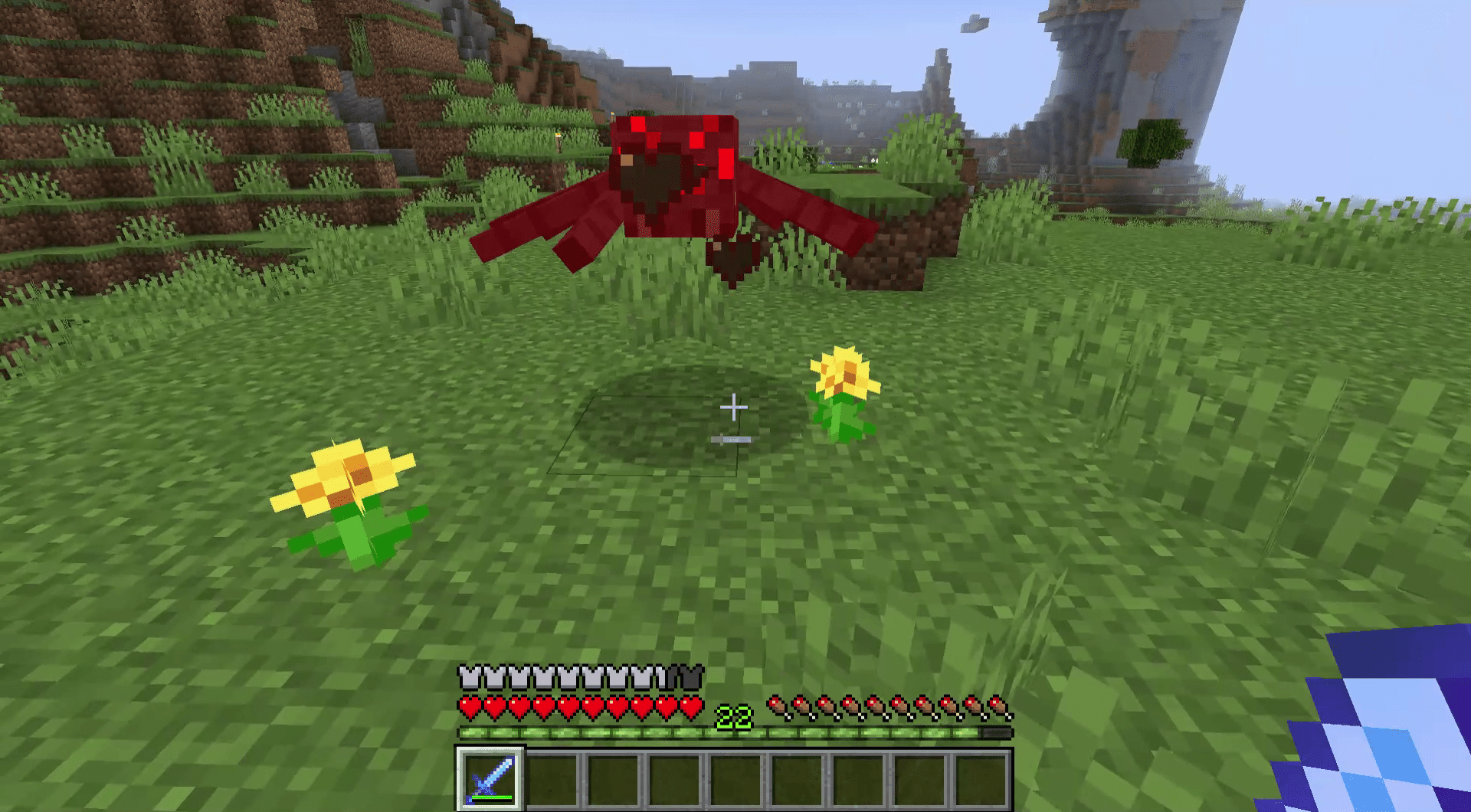 Uma captura de tela da luta contra uma aranha no Minecraft.