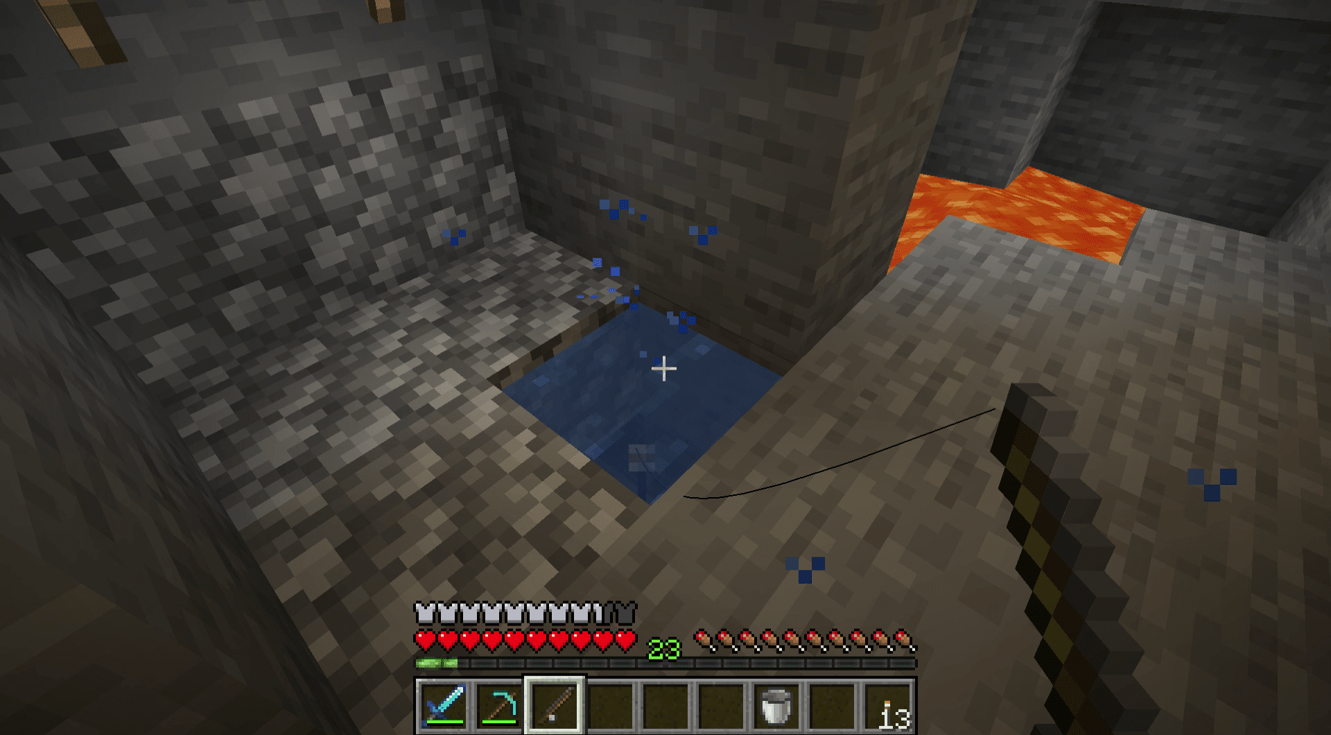 Uma captura de tela da captura de um peixe em um buraco de pesca de um bloco no Minecraft.