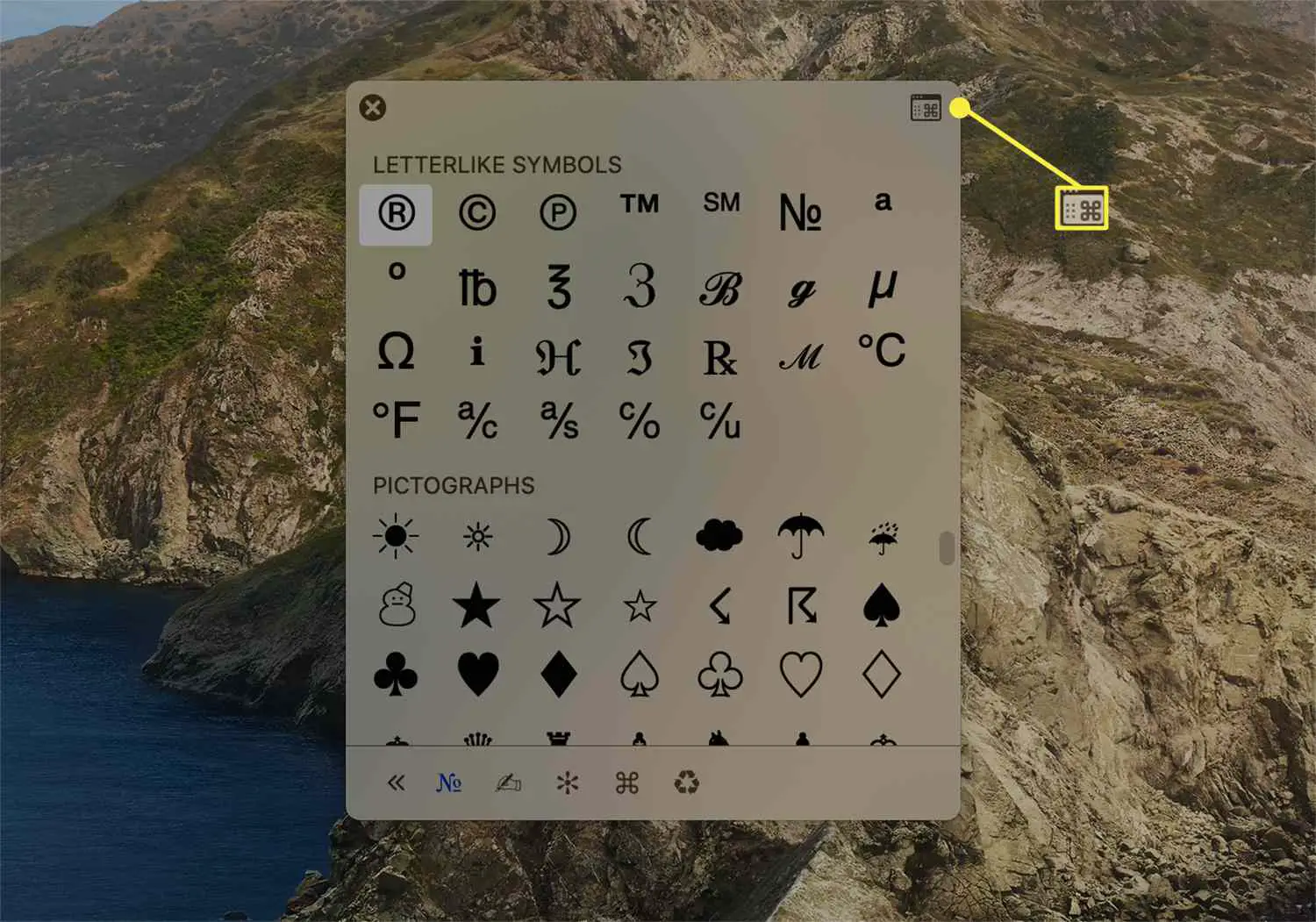 Ícone para ampliar as opções de emojis e símbolos no macOS